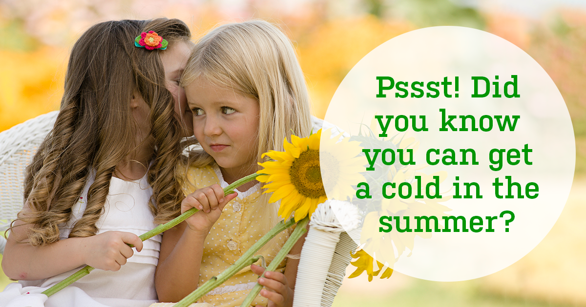 Two little girls sitting in a white wicker chair. One is whispering to the other. Text reads: Pssst! Did you know you can get a cold in the summer?